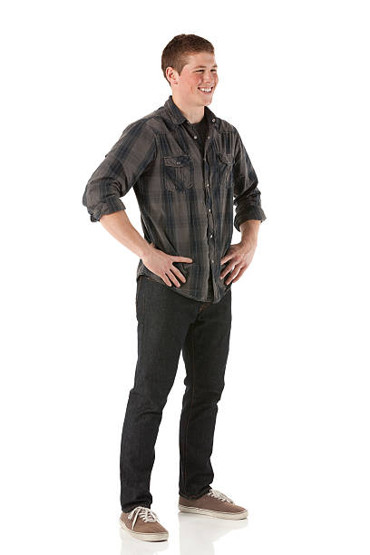 istock Side view of a young man posing against white background 174955622