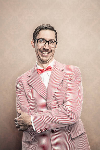 istock Goofy fancy dressed Nerd with bow tie and glasses 174956373