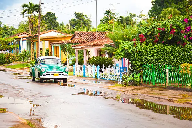 Vintage car in a colorful Vinales (Pinar del Rio, Cuba).