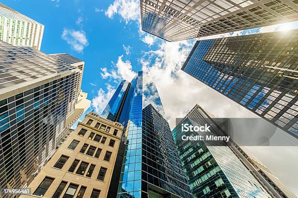 Manhattan Skyscapers Office Buildings New York Stock Photo - Download Image Now - Low Angle View, New York Stock Exchange, Sun