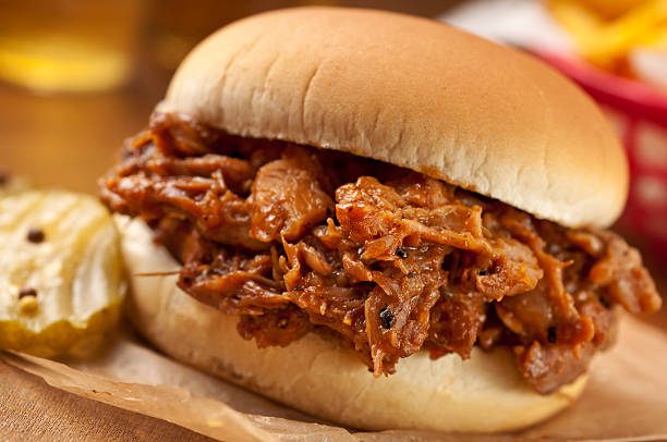 Pulled Pork BBQ Pulled pork BBQ sandwich.  Please see my portfolio for other food related images. barbecue pork stock pictures, royalty-free photos & images