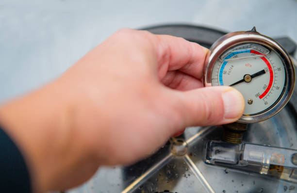 istock water pressure gauge in hands 1749567904