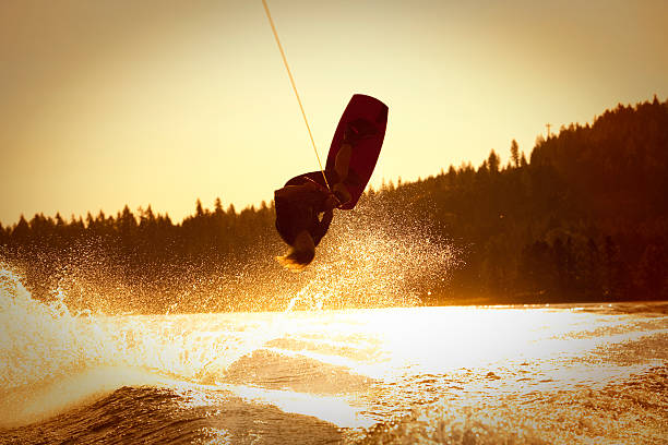 istock Wakeboarder inverted at sunrise 174956998
