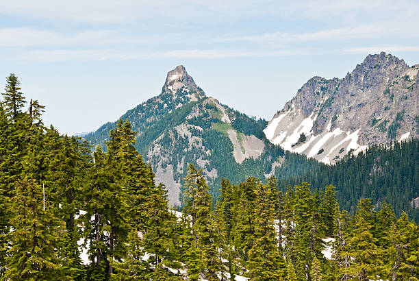 McClellan Butte The Alpine Lakes Wilderness, created by the US Congress in 1976, has more than 700 lakes and mountain ponds filling practically every low spot in this glacier-carved terrain. This view of McClellan Butte was photographed from Granite Mountain in the Alpine Lakes Wilderness near Snoqualmie Pass, Washington State, USA. jeff goulden alpine lakes wilderness stock pictures, royalty-free photos & images