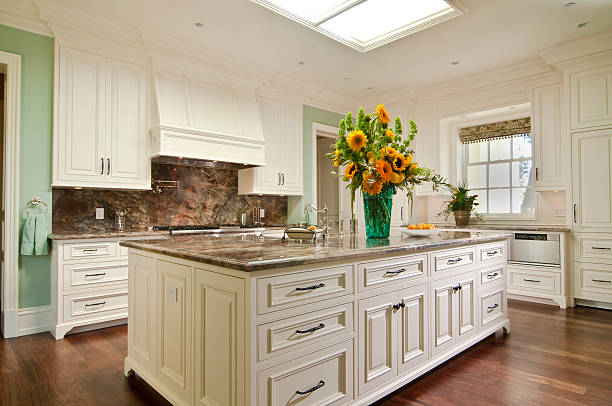 istock Grand Traditional White Kitchen with Sunflower arrangement 174958038