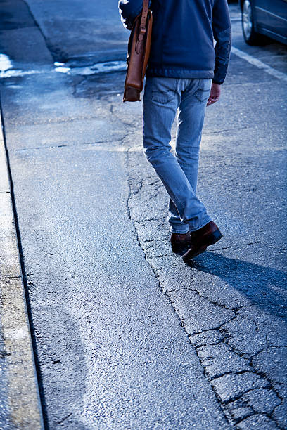 man walking down street - sc0581 ストックフォトと画像