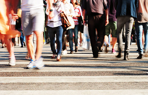 istock People crossing street, motion blur 174958757