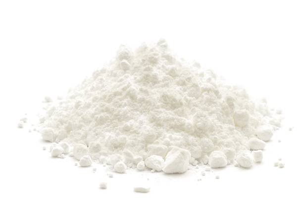istock A small heap of icing sugar on a white background 174958796