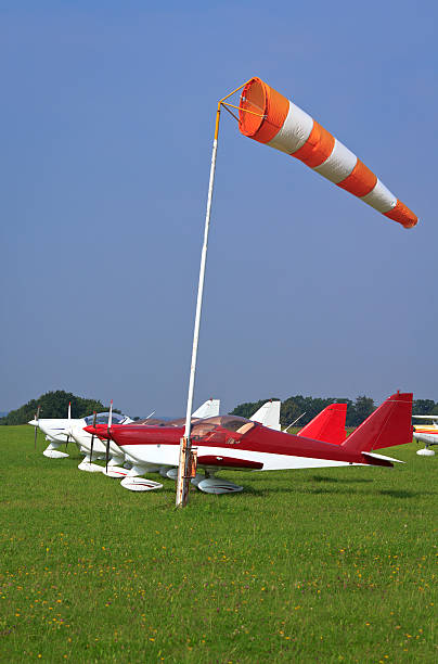 Summer scene with small single engine propeller airplanes on the airfield See more AIR VEHICLE images here: