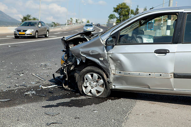 A gray car that was in a car crash stock photo