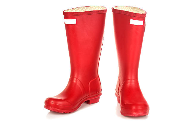 red gumboots - shoe female new macro stock-fotos und bilder