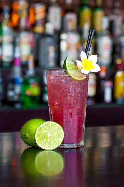 Rasberry Long Island Iced Tea cocktail on the bar table stock photo