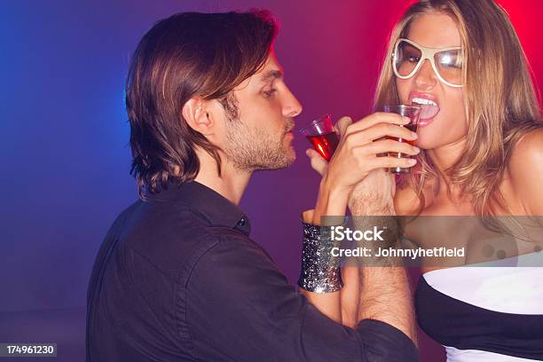 Couple Drinking Jello Shots Stock Photo - Download Image Now - Sensuality, Shot Glass, 20-24 Years