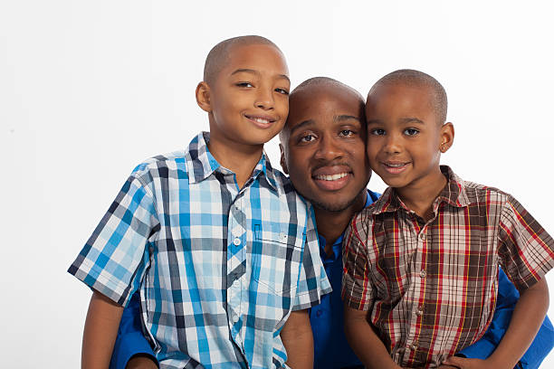 istock African American father and sons on a white background. 174961792
