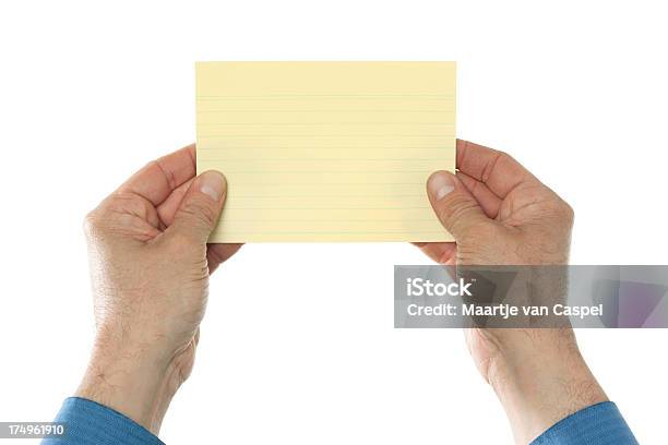 Business Hands Holding Yellow Index Card Stock Photo - Download Image Now - Adult, Adults Only, Blank