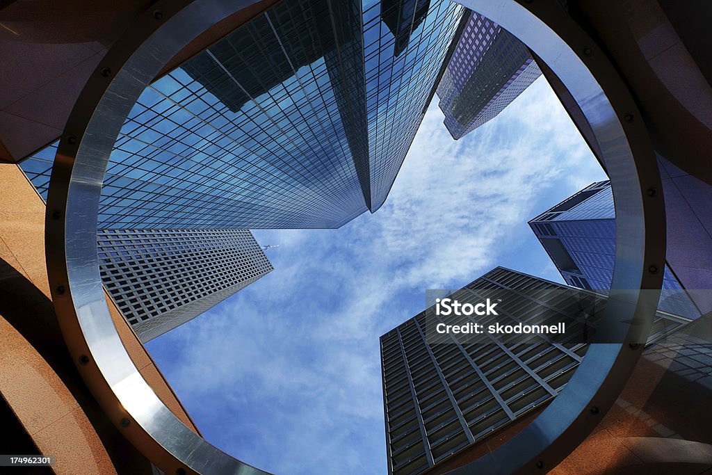 Downtown Houston Texas This is a photo taken from a low angle with a wide lens looking up at the tall skyscrapers in downtown Houston.Click on the links below to view lightboxes. Circle Stock Photo