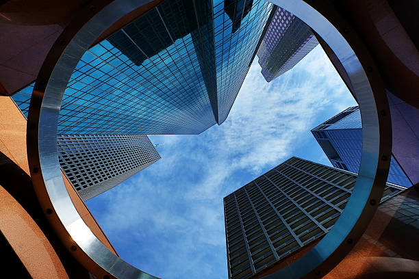 Downtown Houston Texas This is a photo taken from a low angle with a wide lens looking up at the tall skyscrapers in downtown Houston.Click on the links below to view lightboxes. below stock pictures, royalty-free photos & images