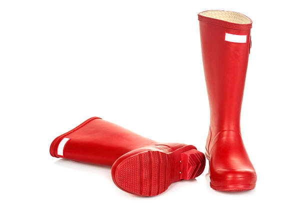 Red gumboots Red gumboots isolated on white red boot stock pictures, royalty-free photos & images