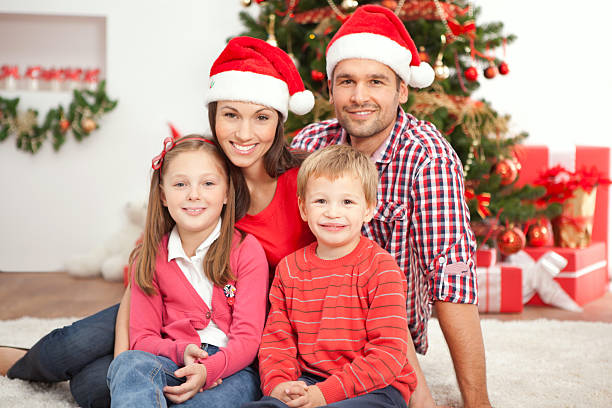 istock Family by christmas tree. 174962444