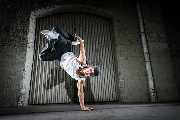 istock cool young man dancing in the street 174962713
