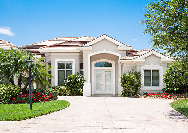 istock New Home with Geraniums and Palm Trees 174962786