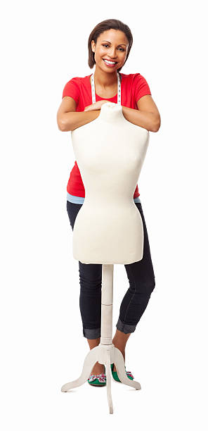 Female Fashion Designer Standing With Mannequin - Isolated Full length portrait of a young African American female fashion designer standing with mannequin. Vertical shot. Isolated on white. woman tailor stock pictures, royalty-free photos & images