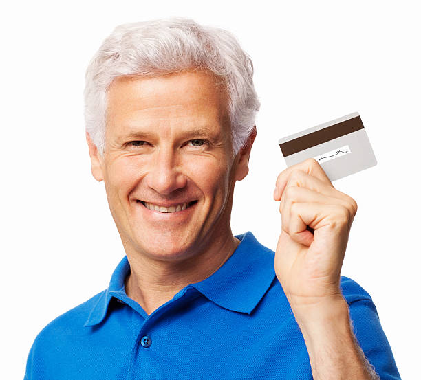 istock Happy Senior Man Holding Credit Card - Isolated 174963545