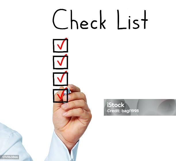 Checking The Checklist Stock Photo - Download Image Now - Check Mark, Adult, Agreement