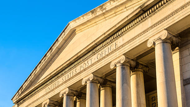 istock Classic Post Office Front Entrance under Sky of Blue 174963928
