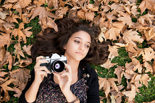 istock Teenage girl with camera 174964547