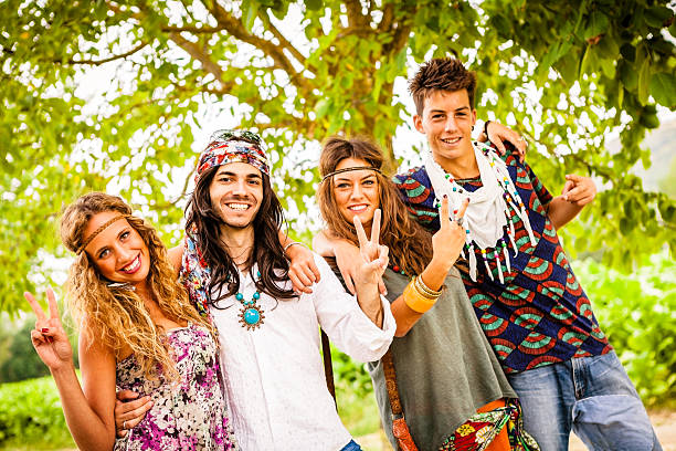 istock Hippie Group Making Peace Signs Outdoors 174964721