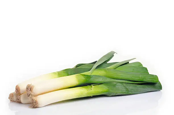 Green leek isolated on a white background.