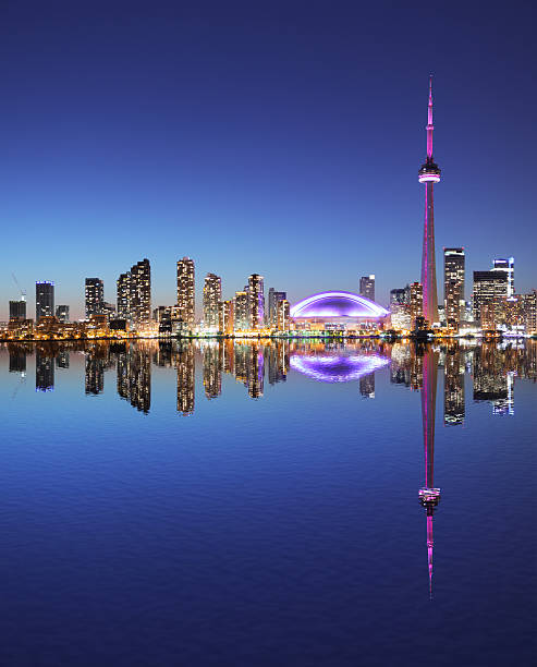 istock Illuminated Toronto City at Night with Water Reflection 174964906