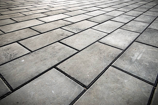 atiraram pedras fundo - stone paving stone patio driveway - fotografias e filmes do acervo