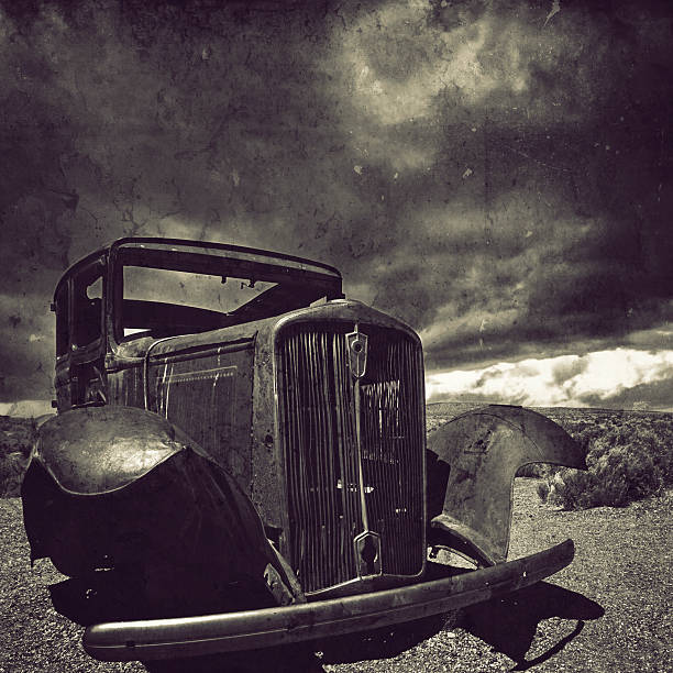Rusty antique car in the Arizona desert. Cross-processed and texture added.