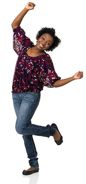 istock Happy Dancing Young Woman Standing On White Background 174966134