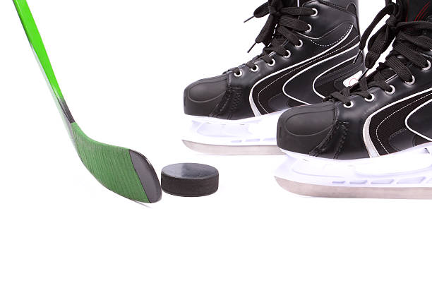 istock Hockey stick, skates and puck 174966373