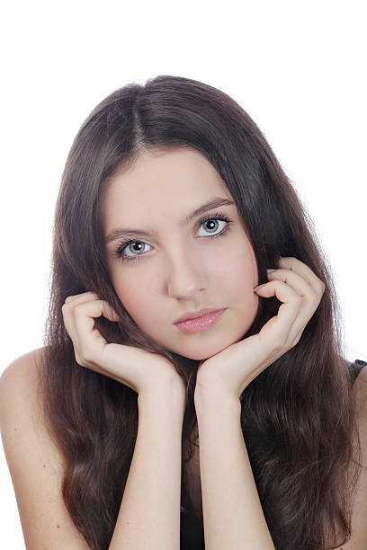 istock cute teenager wqith head in hands 174966500