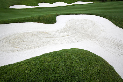 Closer look at empty Golf course bunker