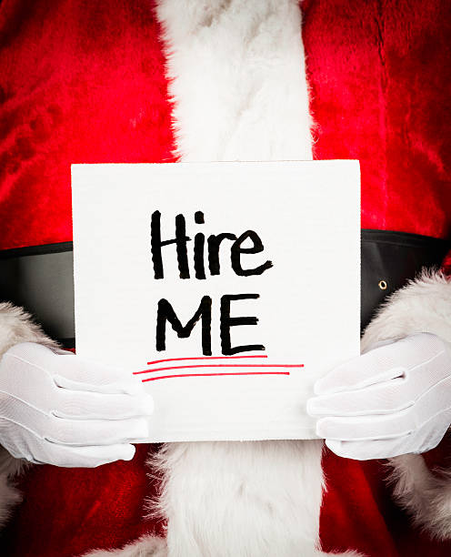 istock Santa with Hire Me Sign 174966872