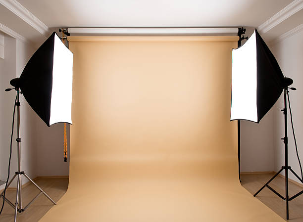 Empty photographic studio Empty photographic studio ready for shoot with brown background television camera photos stock pictures, royalty-free photos & images