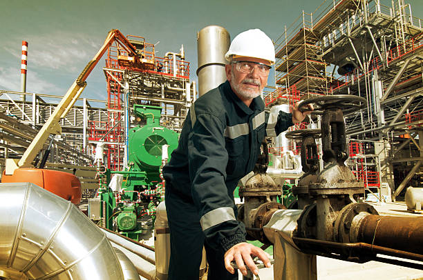 machines, engineer and oil industry stock photo