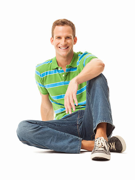 istock Relaxed Man Sitting On Floor - Isolated 174968191