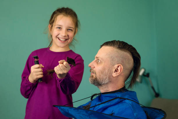 istock Daughter's Turn to Trim Dad 1749685596
