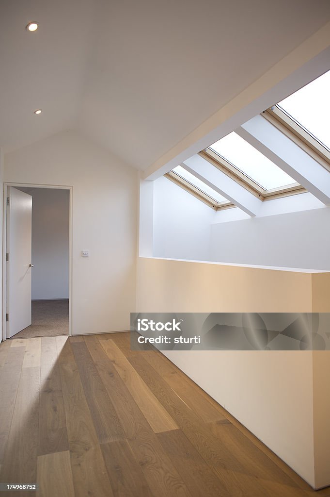 modern loft conversion attic space in a house converted to living space Attic Stock Photo