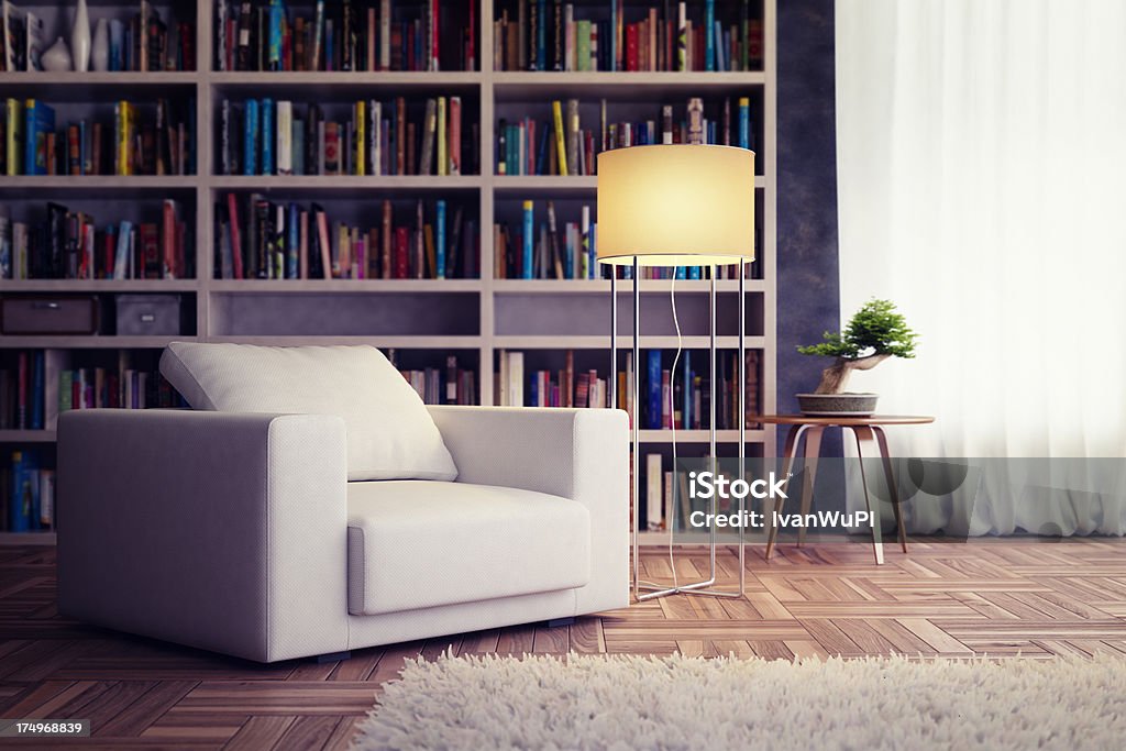 Chair in modern living room Chair in minimalist interior against bookshelves with lamp Apartment Stock Photo