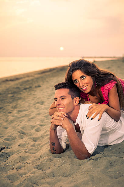 istock Couple on the beach at Sunset 174968865