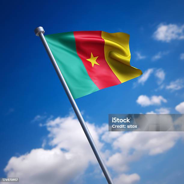 Flag Of Cameroon Against Blue Sky Stock Photo - Download Image Now - Africa, Blue, Blurred Motion