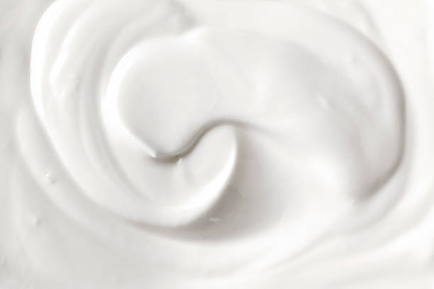 Fresh yogurt Close up of fresh yogurt greek yogurt photos stock pictures, royalty-free photos & images