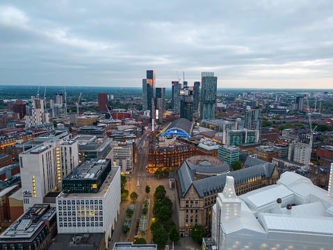 manchester, United Kingdom – October 01, 2023: Aerial view of a vibrant and bustling city skyline in Manchester, United Kingdom